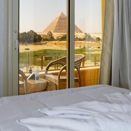 Pyramids Land Palace Kafrat al Jabal Bagian luar foto