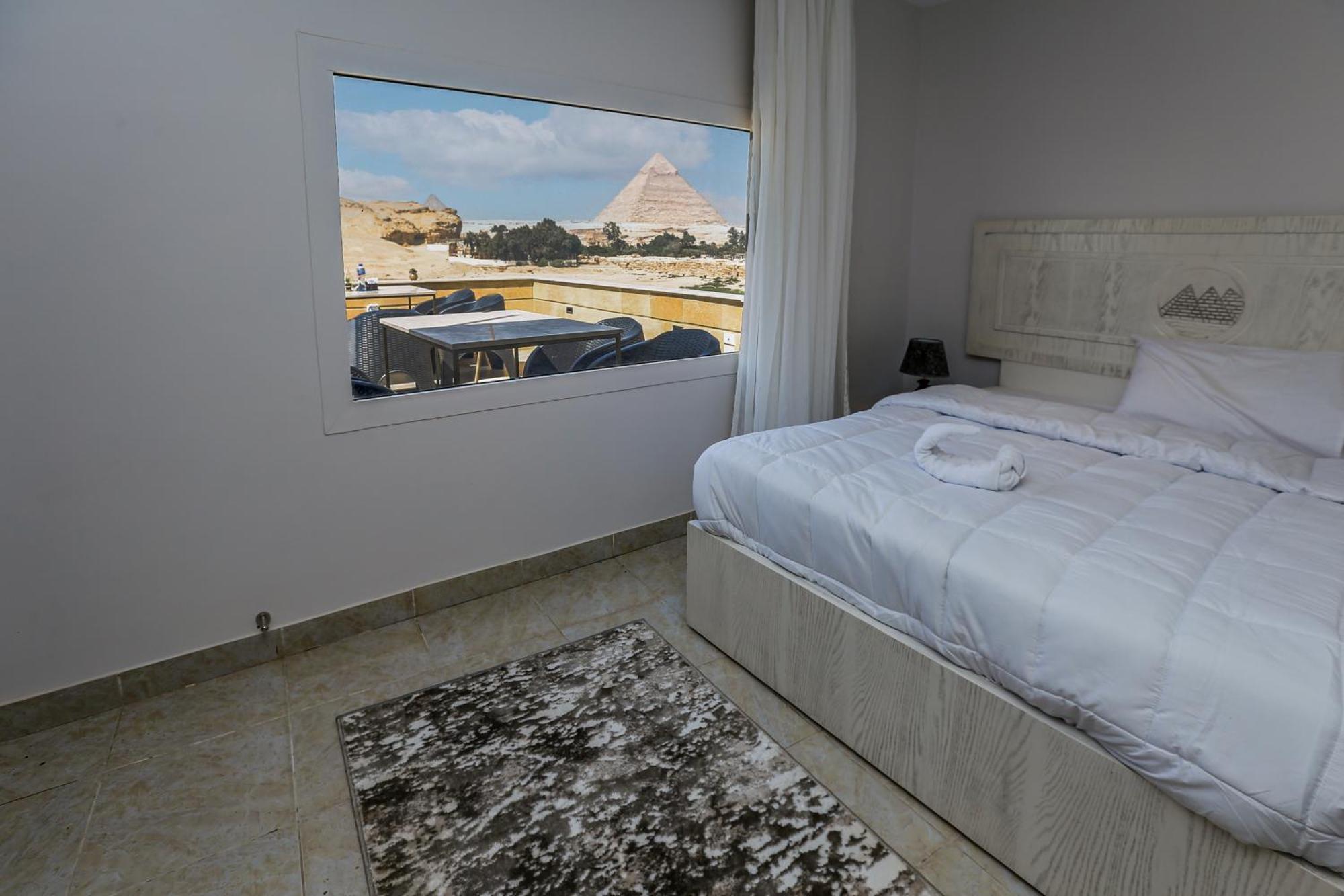 Pyramids Land Palace Kafrat al Jabal Bagian luar foto