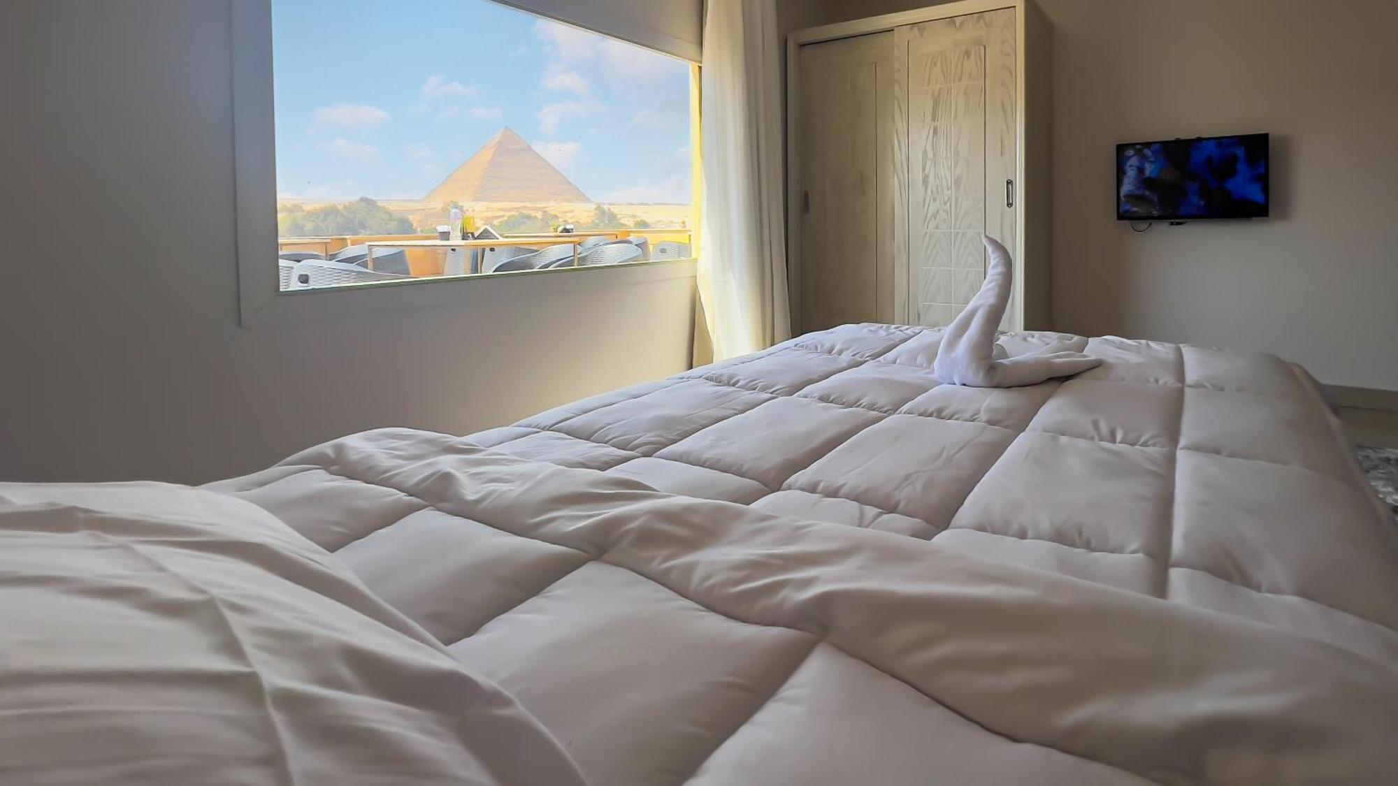 Pyramids Land Palace Kafrat al Jabal Bagian luar foto