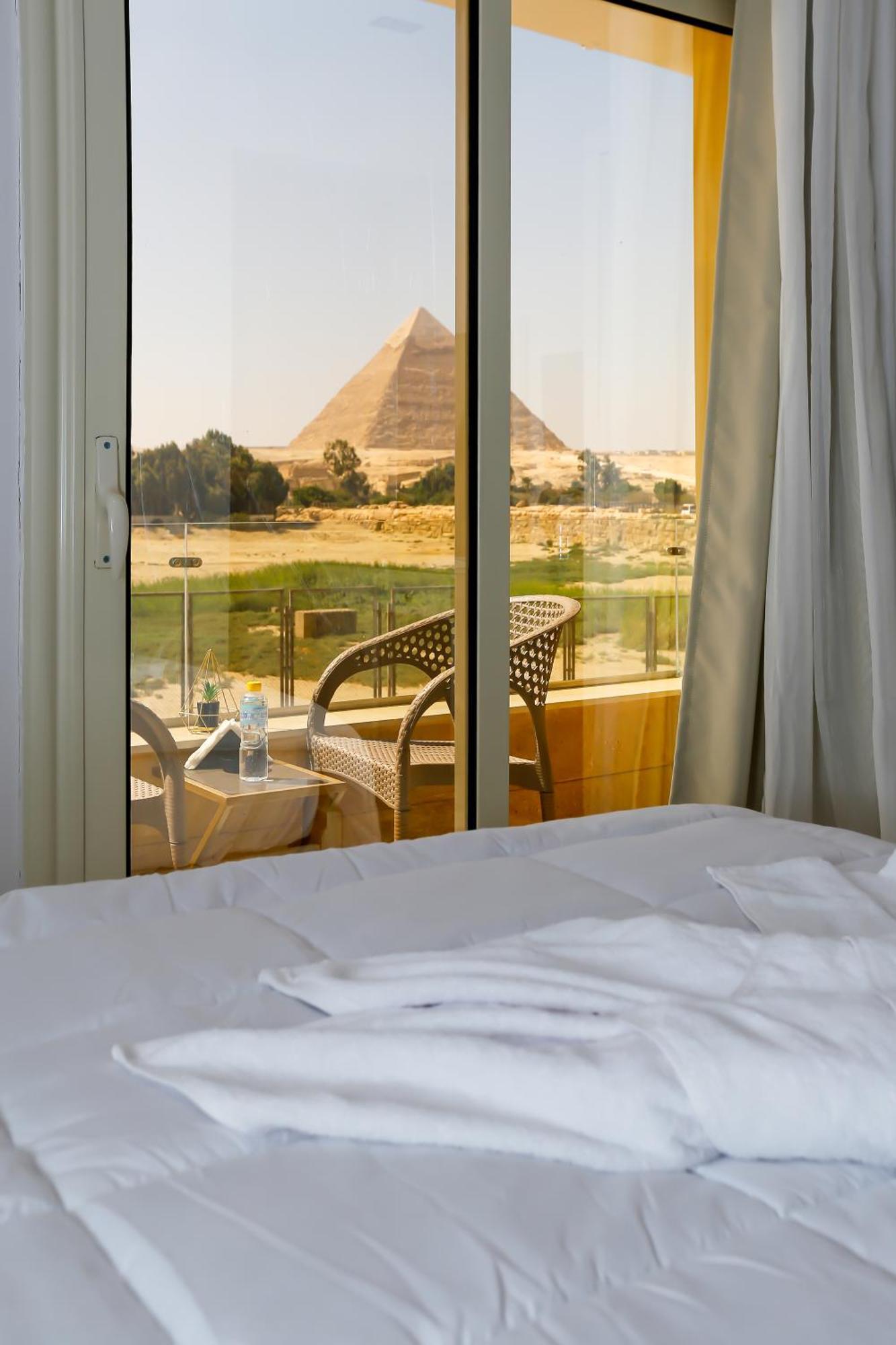 Pyramids Land Palace Kafrat al Jabal Bagian luar foto