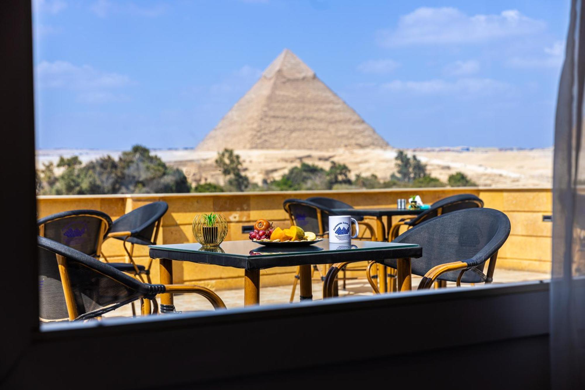 Pyramids Land Palace Kafrat al Jabal Bagian luar foto