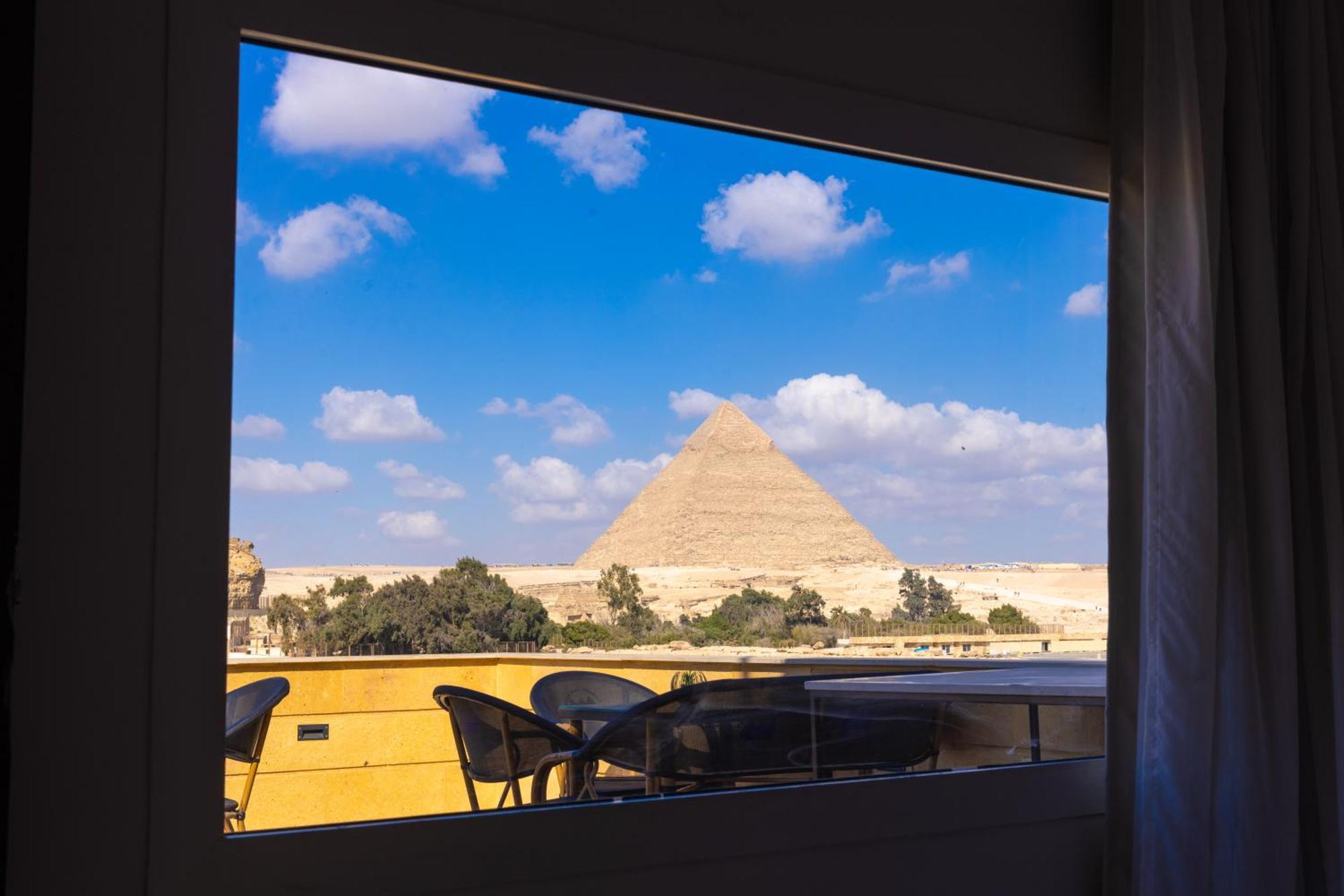 Pyramids Land Palace Kafrat al Jabal Bagian luar foto